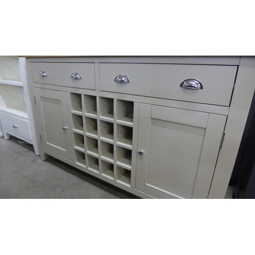 1484 - An oak and truffle painted wine sideboard * This lot is subject to VAT