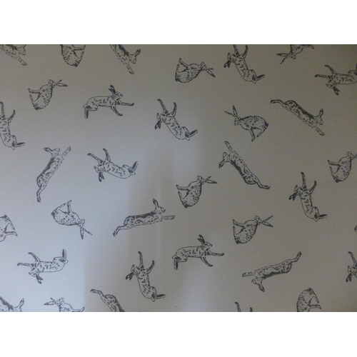 1495 - A forest green upholstered double ottoman storage bed with ottoman (small tear to corner )