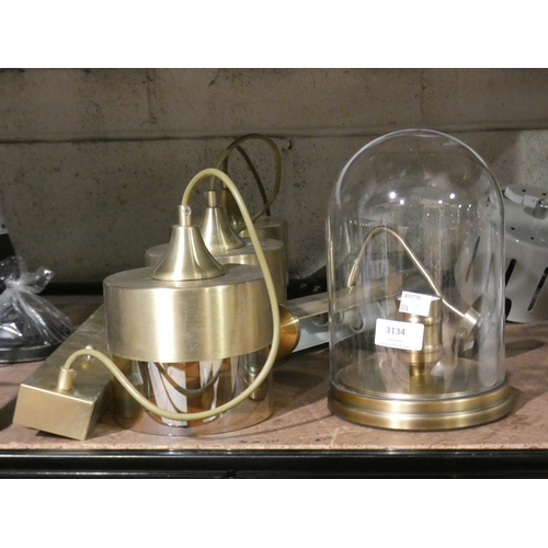 3134 - A brushed gold effect 3-way drop pendant light and a domed glass table lamp * this lot is subject to... 