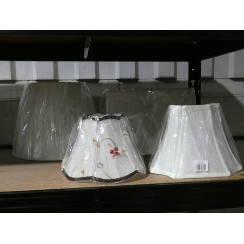 3142 - A quantity of fabric lamp shades; difference sizes and styles * this lot is subject to VAT