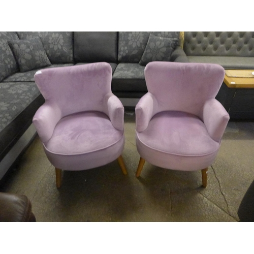 1304 - A pair of Charleston pink upholstered chairs