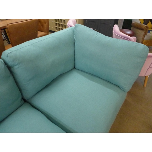 1308 - A turquoise upholstered corner sofa/chaise, slight damage to back