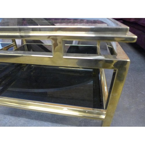 1320 - A brass and glass lamp table * this lot is subject to VAT