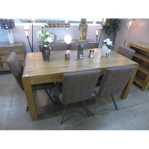 1390 - A Wessex rustic oak 1.8m fixed top dining table and six brown leather effect dining chairs with indu... 