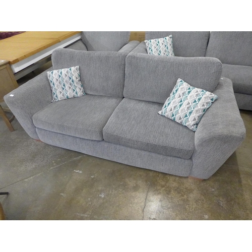 1503 - A light grey two seater fabric sofa with armchair