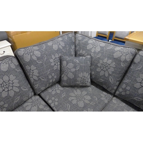 1504 - A Dark Grey and black leather effect Floral Design corner sofa