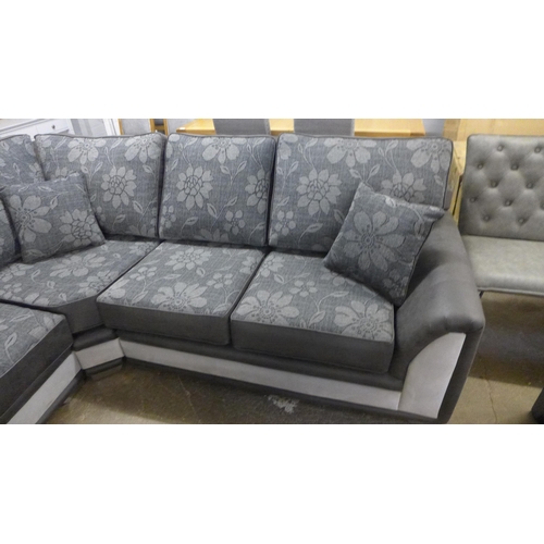 1504 - A Dark Grey and black leather effect Floral Design corner sofa