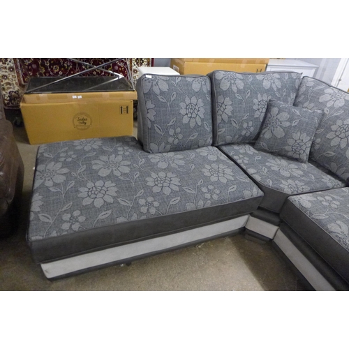 1504 - A Dark Grey and black leather effect Floral Design corner sofa