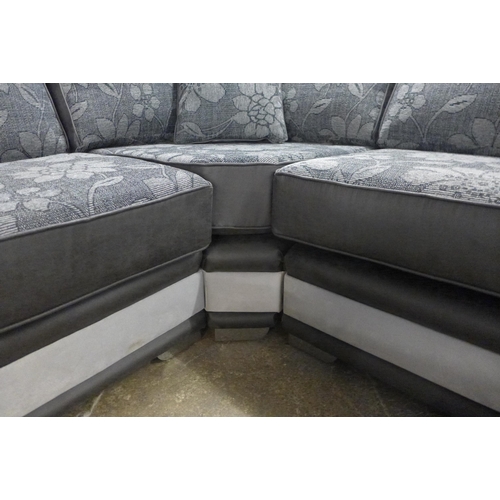 1504 - A Dark Grey and black leather effect Floral Design corner sofa