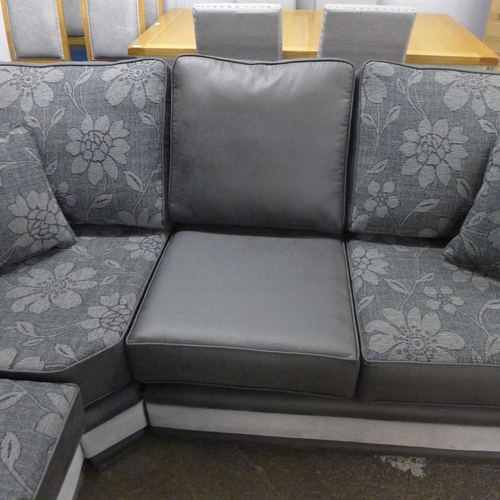 1504 - A Dark Grey and black leather effect Floral Design corner sofa