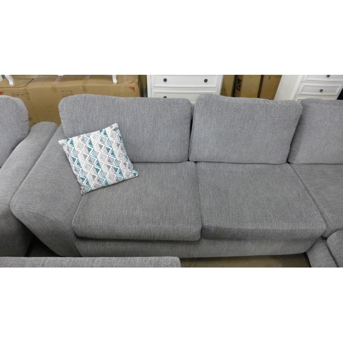 1547 - A light grey fabric corner sofa