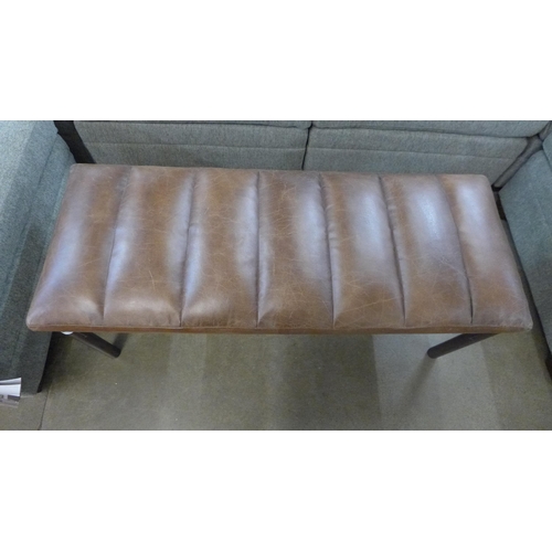 1343 - An industrial style leather and steel bench * This lot is subject to VAT