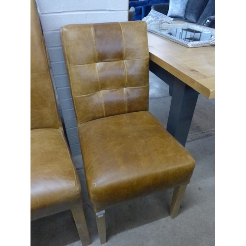 1385 - A tan leather segmented back side chair