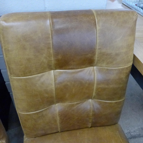 1385 - A tan leather segmented back side chair