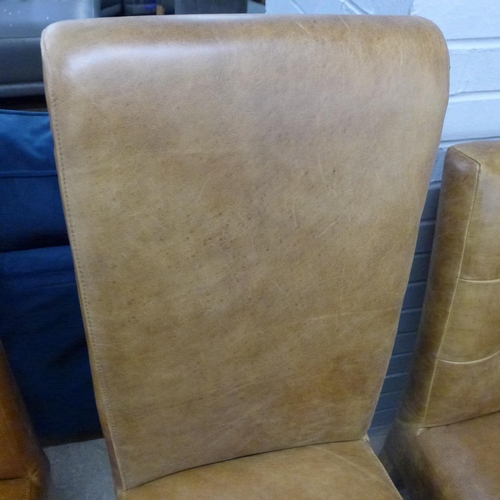 1386 - A light tan leather rollback dining chair