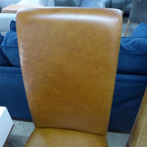 1387 - A tan leather rollback dining chair