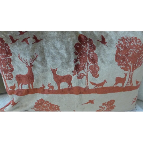 1396 - Two Voyage Maison scatter cushions, hares and a countryside scene