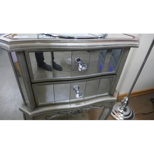 1412 - A mirrored two drawer bedside chest (repaired back leg )