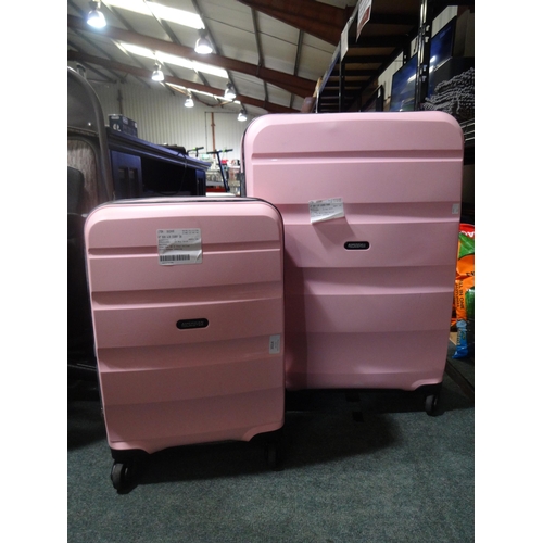 3014 - Two Pink American Tourister suitcases (243-248, 277) * This lot is subject to VAT