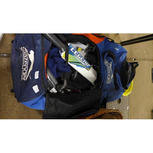 2119 - Large Slazenger holdall with cricket, biking & mixed sporting equipment