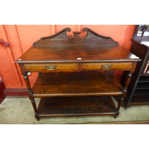 11 - A Victorian mahogany three tier buffet