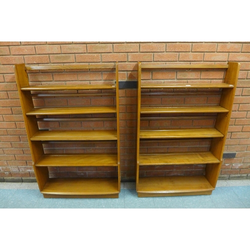 54 - A pair of Ercol Golden Dawn ash open bookcases