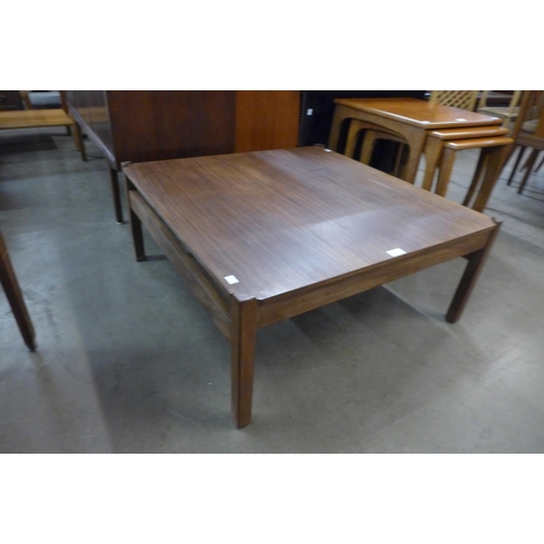 79 - A teak square coffee table