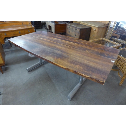 97 - A Pieff Eleganza rosewood and chrome dining table, designed by Tim Bates

*Accompanied by CITES A10 ... 