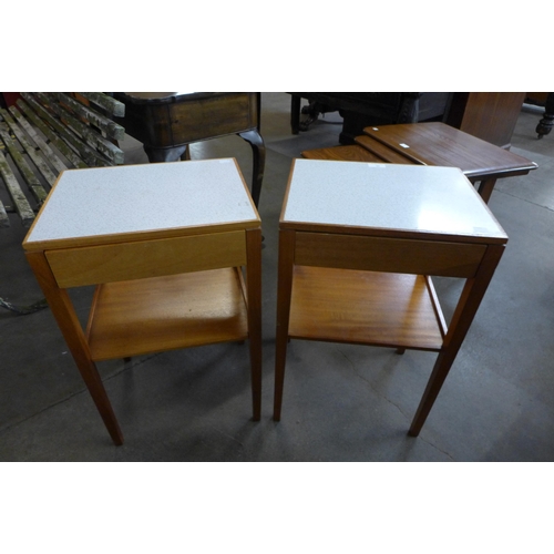 98 - A pair of teak single drawer side tables