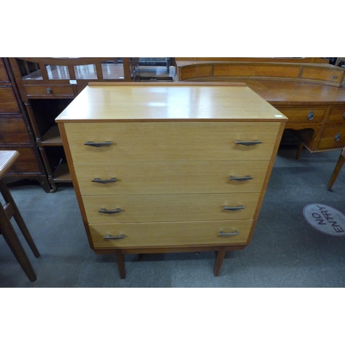 99 - A teak chest of drawers