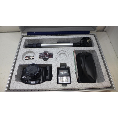1120 - An Akita 35mm film camera set in an aluminium case