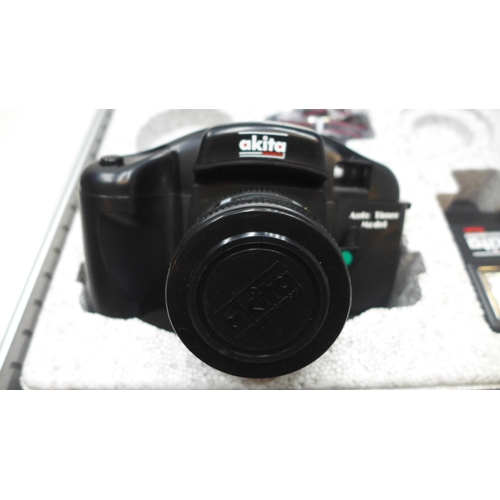 1120 - An Akita 35mm film camera set in an aluminium case