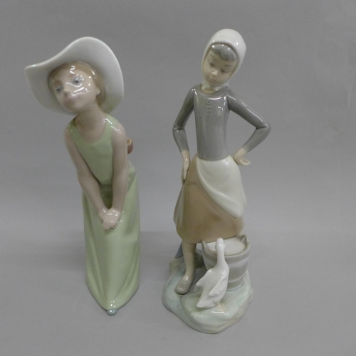 617 - Two Lladro figures, 23cm, ribbon on hat a/f