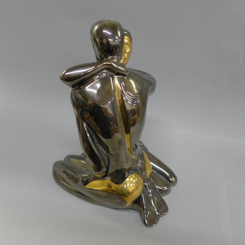 618 - A modern Spanish Galos figure of a couple, 27.5cm