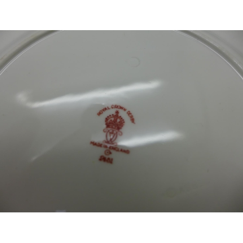 673 - Two Royal Crown Derby 2451 side plates and a cup and saucer, a Shelley cup and saucer, cup a/f (crac... 