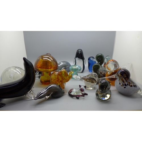 692 - A collection of eighteen glass animals and paperweights including Langham, Caithness and Isle of Wig... 