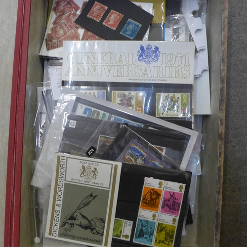 696 - Stamps; a box file of GB stamps, covers, etc.