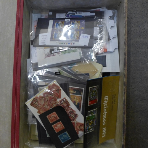 696 - Stamps; a box file of GB stamps, covers, etc.