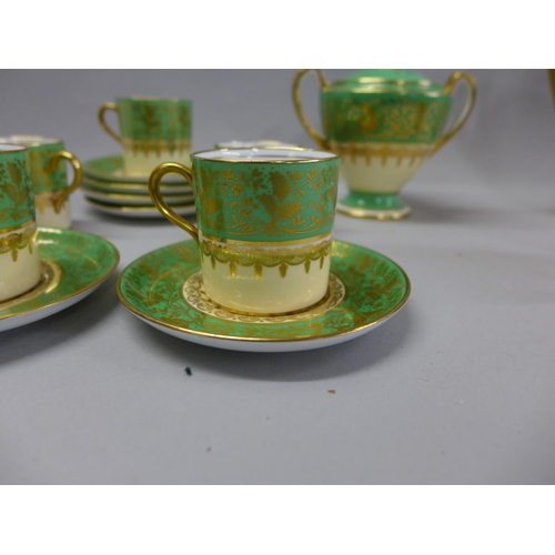 744 - An Aynsley green, gold and white part coffee set comprising five cups, six saucers, cream and sugar ... 