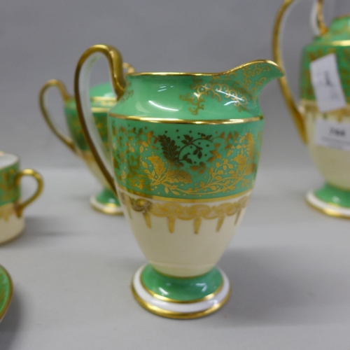 744 - An Aynsley green, gold and white part coffee set comprising five cups, six saucers, cream and sugar ... 