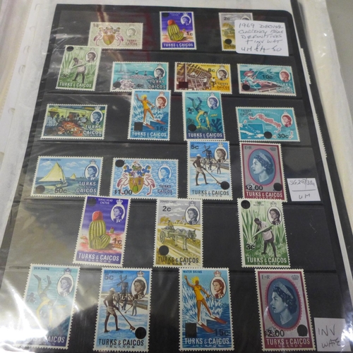 748 - A box with SG part 1 catalogue and ranges of mint Queen Elizabeth II Commonwealth stamps