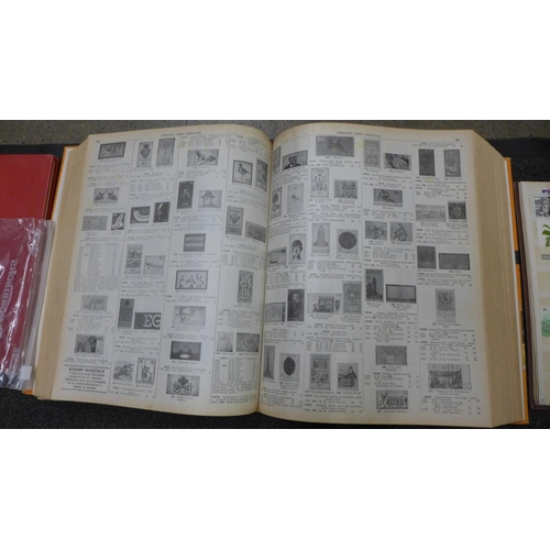 773 - A collection of world stamps in three albums and two stamp catalogues