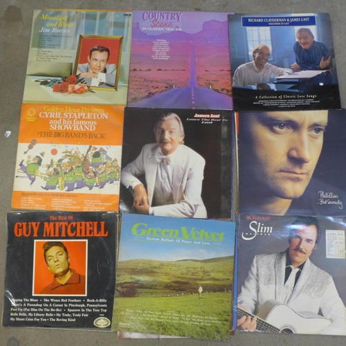 779 - A box of approximately 30 1960's and later LP records including Buddy Holly and Motown, etc.