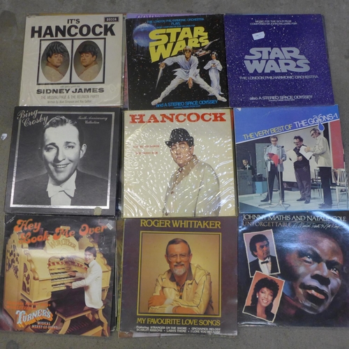 779 - A box of approximately 30 1960's and later LP records including Buddy Holly and Motown, etc.