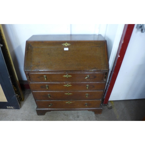 119 - A George III oak bureau
