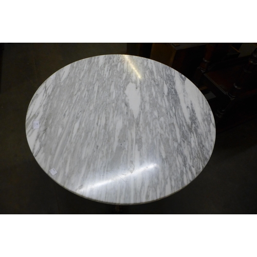 37 - A 19th Century French carved mahogany and marble topped gueridon table