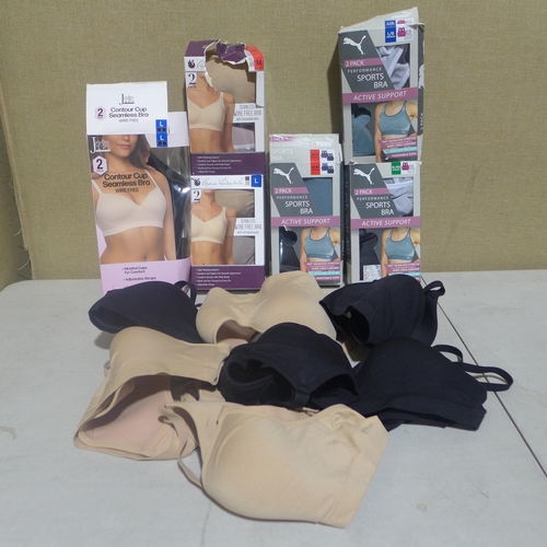 A quantity of lady's bras including Puma and Carole Hochman