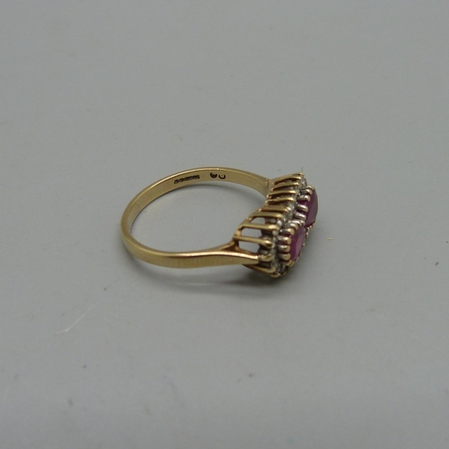 1032 - A 9ct gold, ruby and white stone ring, 2.4g, M