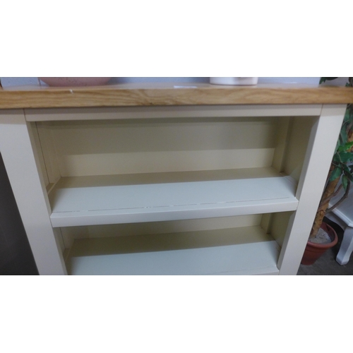 1396 - A Salisbury cream painted and oak small bookcase *This Lot is Subject to VAT*