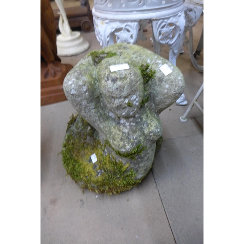 298 - A carved stone mermaid garden ornament